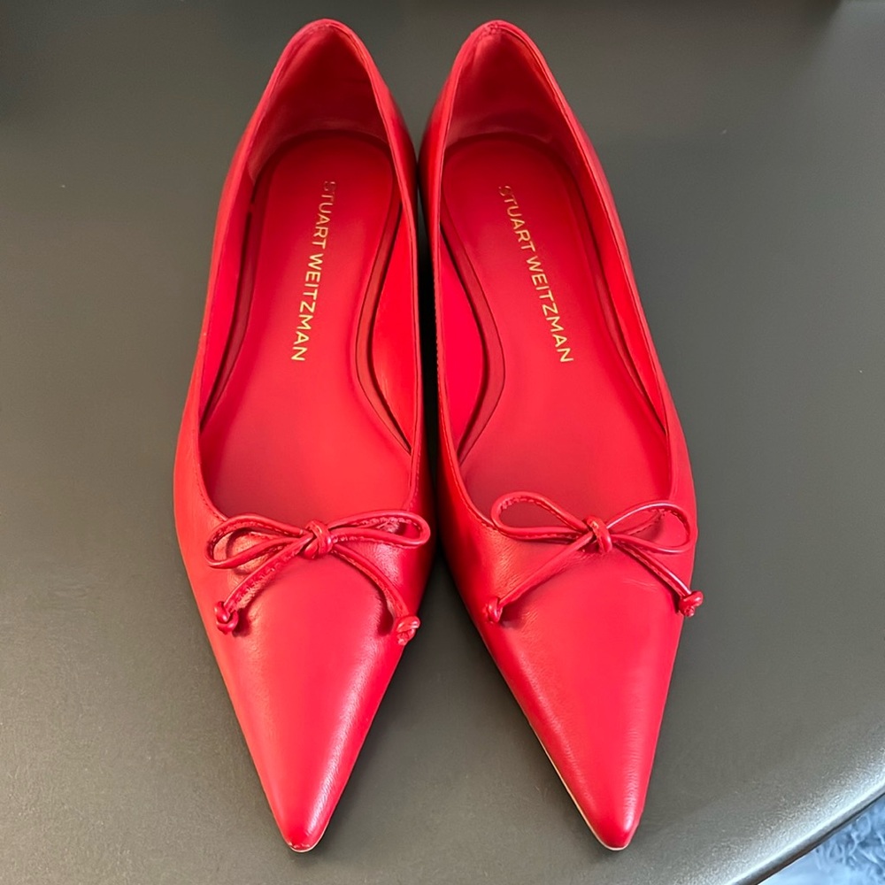 Red pointy flats